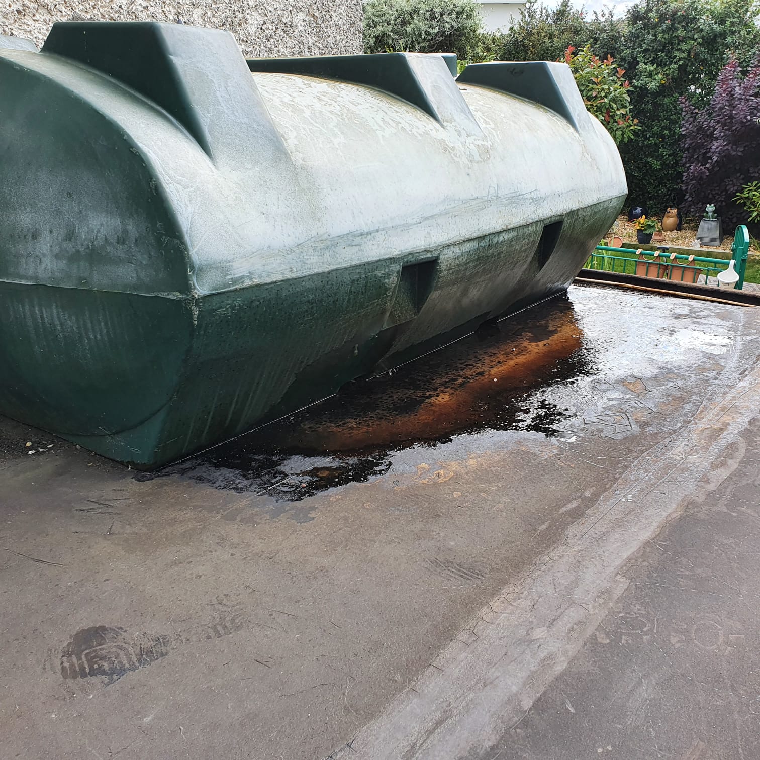 Kerosene pooling across a driveway