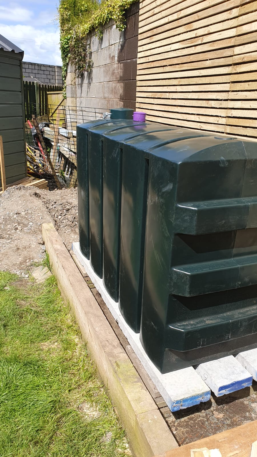 Kingspan Titan R1200 single skin heating oil tank installed on a concrete base